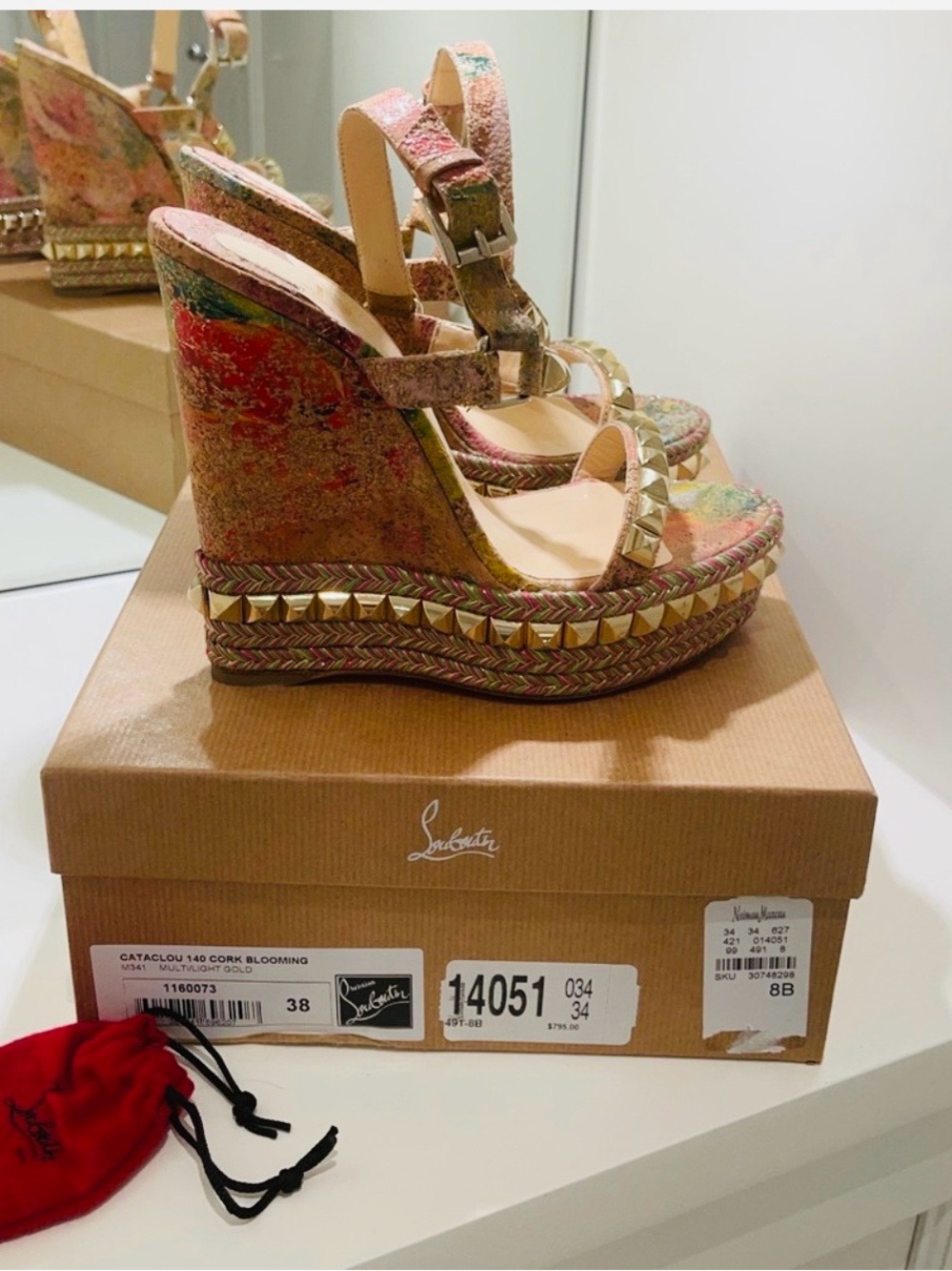 Christian Louboutins
cataclou 140 cork blooming
